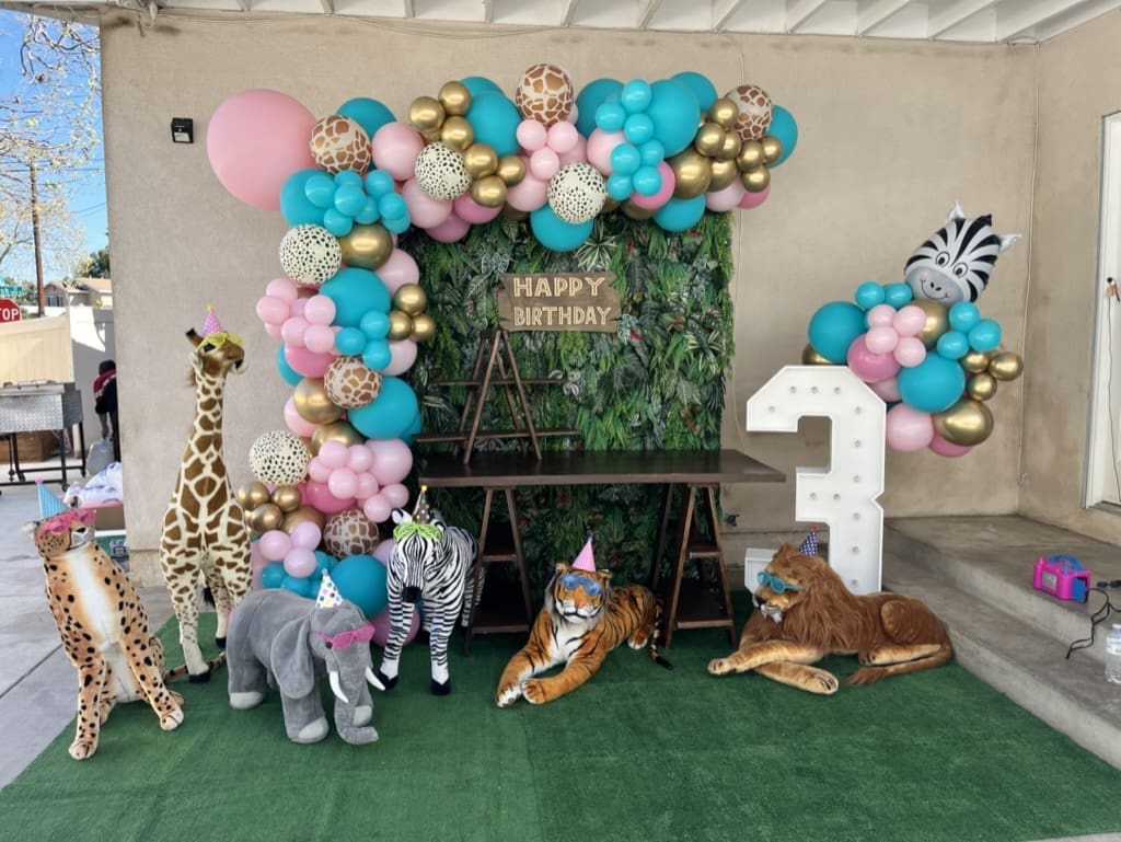 happy birthday balloon backdrop for 3rd birthday with animals and a safari theme